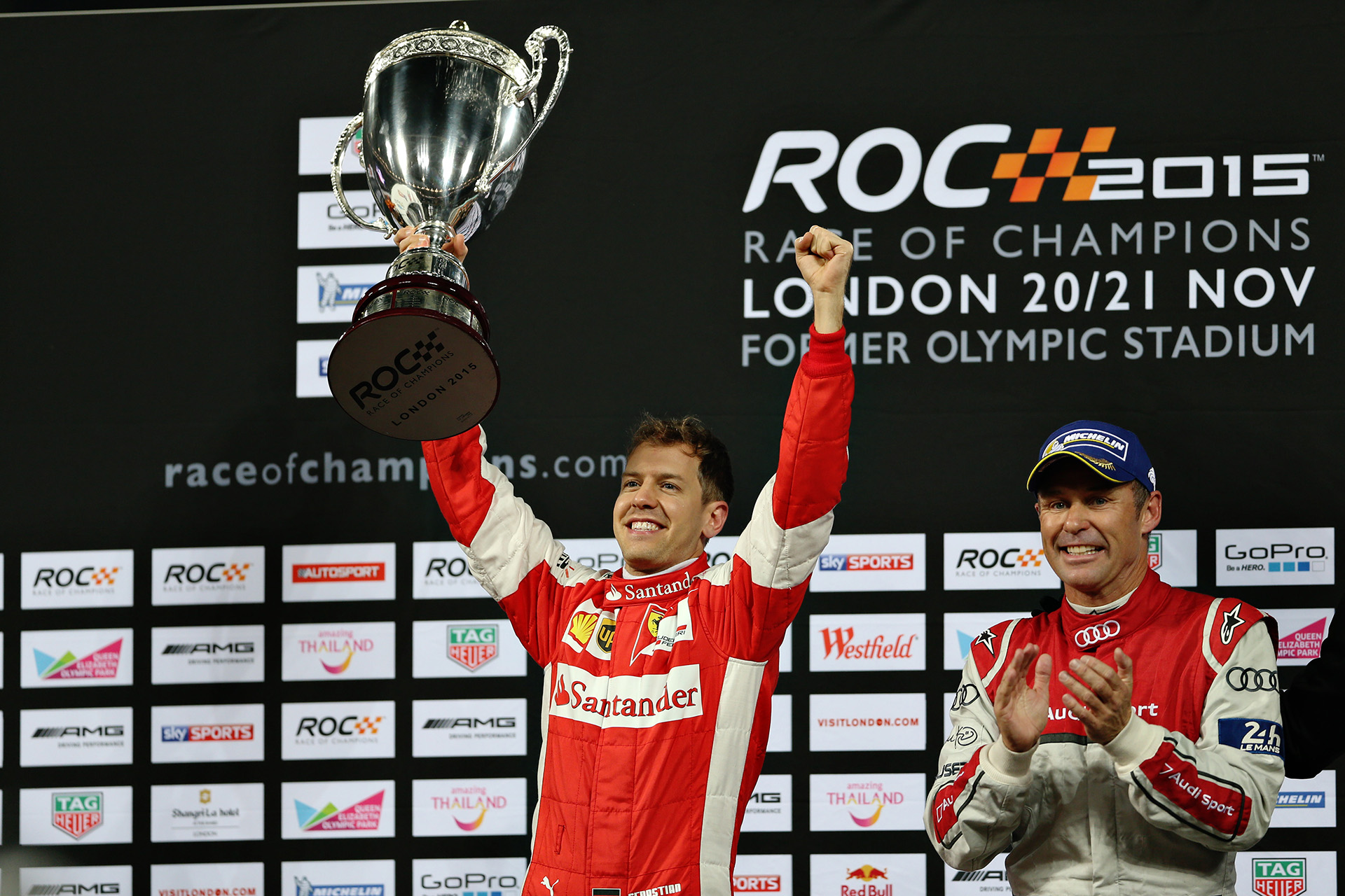 ROC London_Sebastian Vettel (GER) celebrates his Race of Champions win on the podium with Tom Kristensen (DMK)_1063